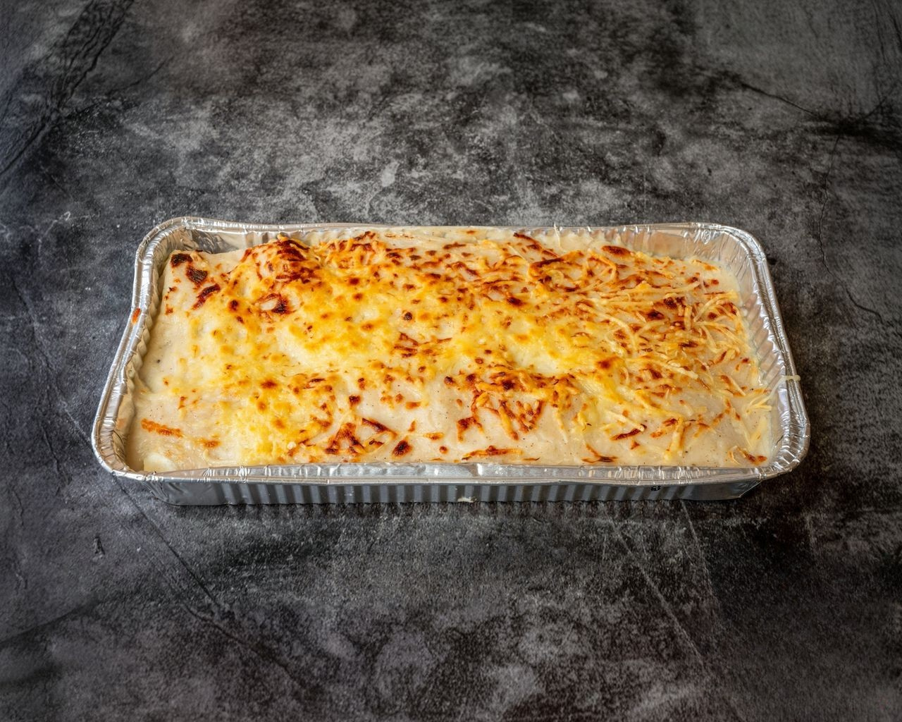 Canelons casolans gratinats